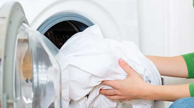 Cho rèm vào máy giặt